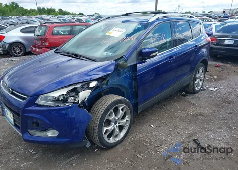 2013 Ford Escape Titanium z USA, uszkodzony, nr VIN 1FMCU0J95DUD37885